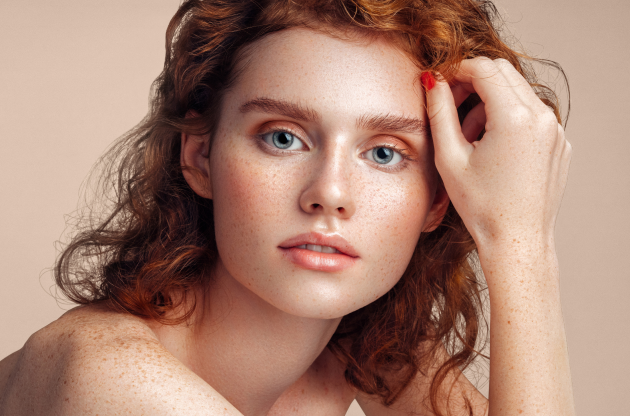 woman sitting with red hair